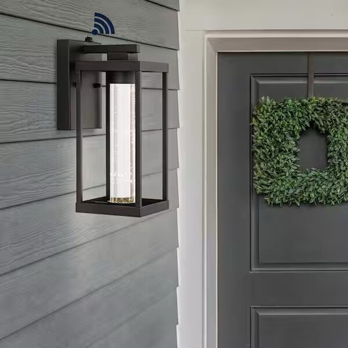 JONATHAN Y Juno Black Outdoor Sconce Iron/Seeded Glass with Dusk-to-Dawn Sensor - Image 5